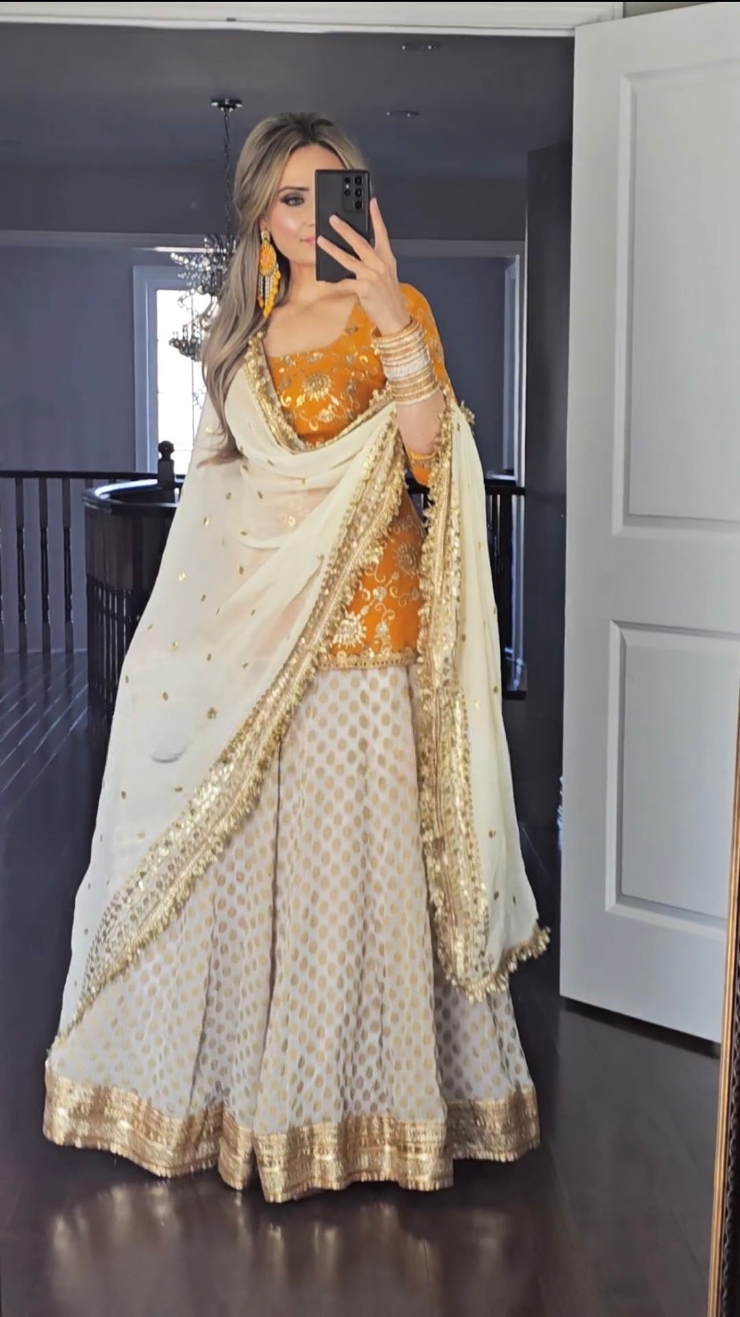 Yellow and White Faux Georgette Lehenga Suit