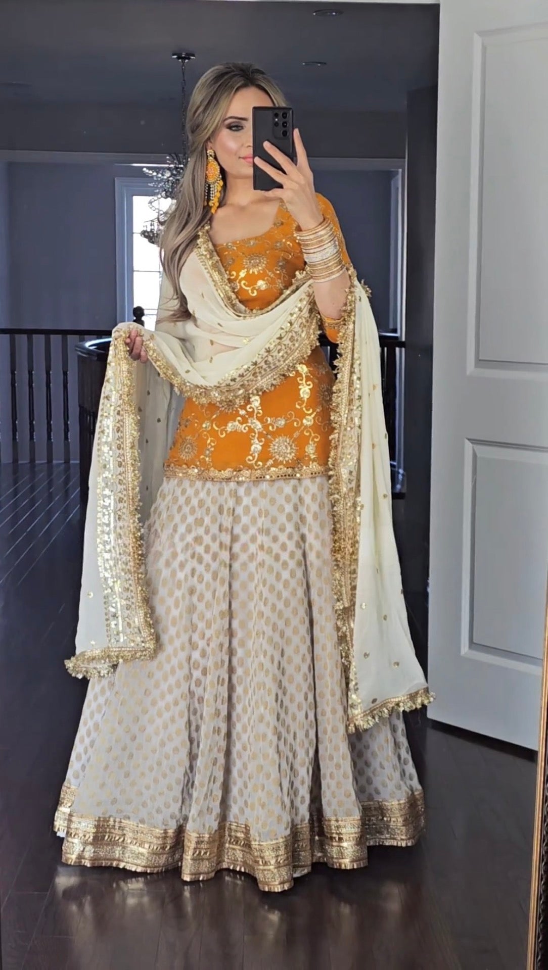 Yellow and White Faux Georgette Lehenga Suit